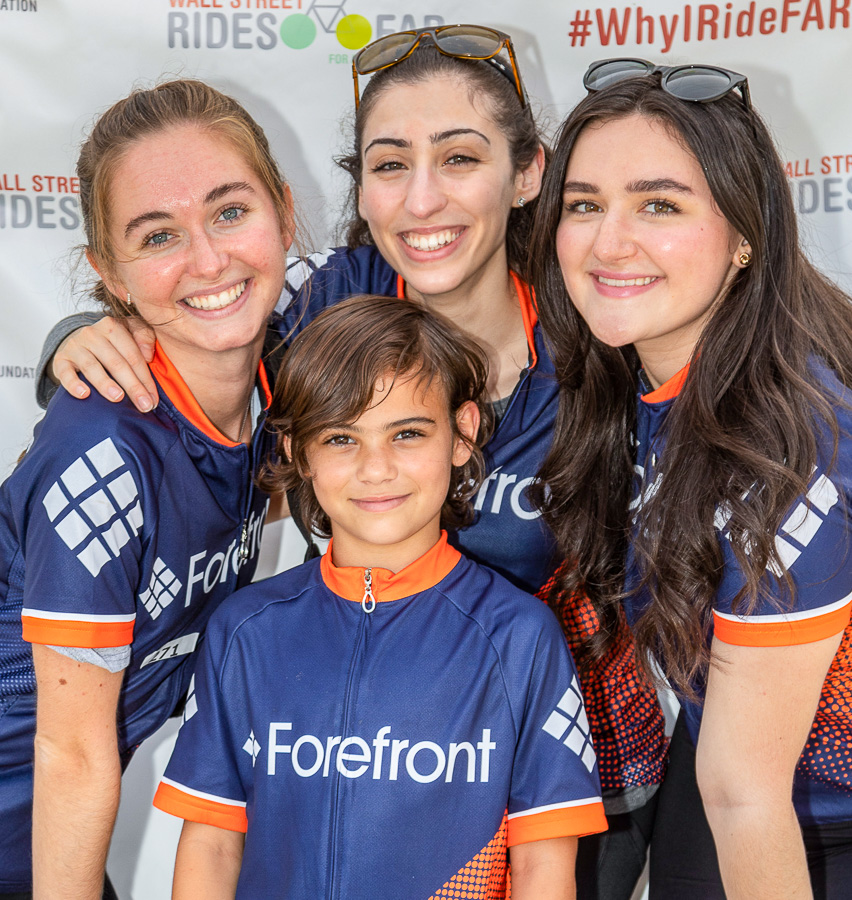 Team Forefront walkers and riders mug for the camera in the finish line after and a fun filled day of participating in the FAR Autism Ride and walk.